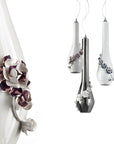Decorative pendant lamps with floral designs on a white background