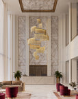 Grand hotel lobby with soaring ceilings and spiral Lustralis chandelier by Masiero, adding Italian elegance. Available at Spacio retail stores in Mumbai & Kolkata.