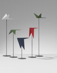 A group of Madlab's ML Animal Mood Birds (5pc set) standing on a table.