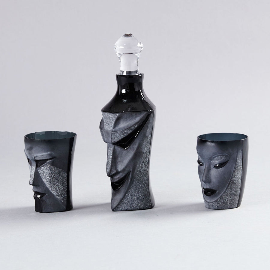 Side view of Crystal Kubik Black Tumbler with Black Lucifer decanter and Electra Tumbler on a grey back ground from Masque collection by Maleras for modern interiors available at Spacio India from the Drink ware of Bar Accessories Collection.