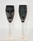 Maleras Crystal Champagne Glass Kubik Black with Electra Black Champagne Glass from Masque collection on a white back ground for modern interiors available at Spacio India from the Drink ware of Bar Accessories Collection.