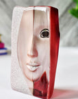 Side look of Maleras Crystal Mazzai Red Sculpture on a white surface in modern interiors available at Spacio India from Sculpture and Art Objects Collection of Crystal Sculptures.