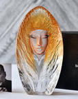 Maleras Crystal Dawn Gold Sculpture with Mats Jonasson photo on a white surface in modern interior available at Spacio India from Sculpture and Art Objects Collection.