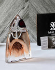 Decorative crystal sculpture of Viking from Maleras along with picture of Mats Jonassan