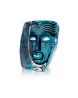 Angled perspective of Maleras Ari Crystal Sculpture showcasing sophisticated carved lines and vivid teal hues, hand made by Maleras, available at Spacio India.