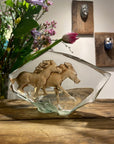 Maleras Large Crystal Horse Swedish Art Glass Sculpture featuring two elegantly detailed, galloping horses in warm brown tones, displayed artistically against a decorative background, exclusively available at Spacio India retail stores and online.