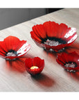 Maleras Crystal Poppy Bowl Collection arranged beautifully on a wooden surface, showcasing varied sizes, available at Spacio India retail stores and online.