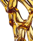 A close up of a yellow Mario Cioni Crystal Arabesque Vase Amber.