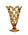 An Mario Cioni Crystal Arabesque Vase Amber vase with crystal ware, designed by Mario Cioni, set against a white background.