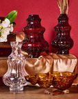 Set of various shapes of crystal vase and centrepiece in red, dark purple, clear and amber finishes