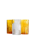 Three crystal vases with different designs - flowers, ferns and tulips on a white background