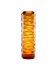 Orange crystal vase with textured design on a white background