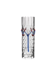 Clear crystal vase with decorative elements on a white background