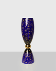Close right look of Mario Cioni Crystal Blue Small Vase Gold Flowers on Grey Surface available at Spacio India for luxury home decor accessories collection of Vases.