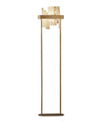 Modern floor lamp with gold base and marble-like shade on a white background by Masiero available at Spacio retail stores in Mumbai & Kolkata.