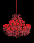 Red chandelier against a black background from Masiero available at Spacio in India