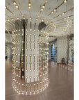 Decorative interior with hanging lights and reflective surfaces