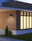 Modern house exterior with illuminated windows at night