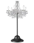 Outdoor crystal chandelier from Masiero's Drylight collection on a black stand against a white background