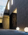 Modern architectural setting with spherical lights on a dark surface
