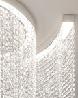 Close-up of a modern ceiling light fixture with a white, textured design.
