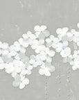 Close-up of Meystyle Cloud Boutique LED Wallpaper with delicate floral details and embedded lighting, available at Spacio India.