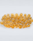 Decorative yellow flower ceiling light on a light gray background