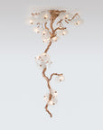 Decorative ceiling light fixture with floral design on a white background