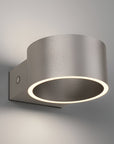 Modern wall-mounted rechargeable light fixture on a gray background