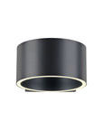 Black cylindrical light fixture on a white background