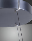 Close-up of a modern ceiling light fixture with a dark gray finish.
