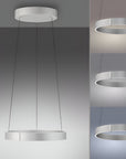 Modern pendant kinetic light fixture on a gray background