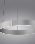 Modern pendant kinetic light with a circular design on a gray background