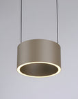 Modern pendant light with a cylindrical shade on a gray background