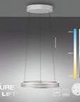 Ceiling Kinetic light fixture with colour temperature scale and Neuhaus name on a gray background