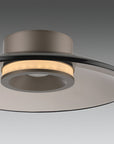 Ceiling light fixture with a modern design on a gray background