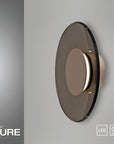 Modern wall light fixture with 'Neuhaus PURE' branding on a gray background