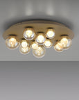 Ceiling light fixture with multiple bulbs on a gray background
