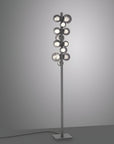 Modern floor lamp with multiple light bulbs on a gray background
