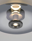 Modern ceiling light fixture on a neutral background