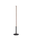 Black floor lamp with a thin, cylindrical design on a white background