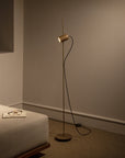 Modern floor lamp in a room with a neutral color palette