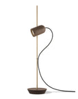 Modern floor lamp with a cylindrical shade on a white background from Nomon available at Spacio retail stores in India.