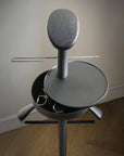 Close up of the Ash wood and graphite finish in the coat hanger
