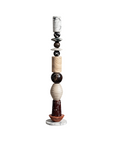 Decorative floor sculptural totem with marble on a white background