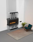 Modern living room with electric fireplace and armchair on a gray floor.