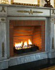 A living room adorned with a Planika Bioethanol Fireplace Hot Box, featuring an elegant framed picture above it.
