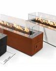 Four fire pits of different designs and materials on a white background
