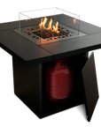 Black fire pit table with flames and a red propane tank on a white background