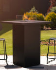 Outdoor gas fire table with chairs on a patio